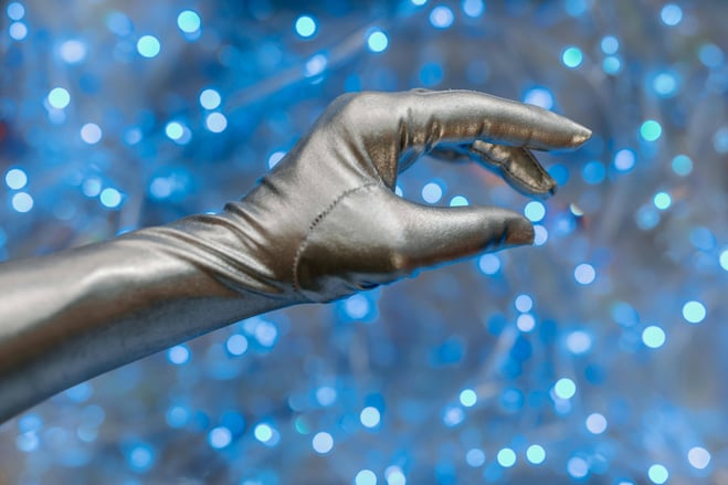 AI-driven insurance claim data analytics concept shown by a robotic hand in a digital interface