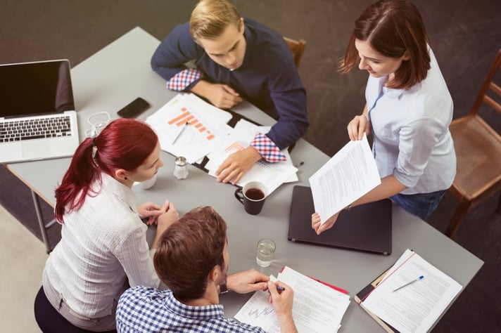 Executives discussing risk management planning during a meeting