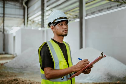 Worker reviewing the execution of incident management processes on-site.