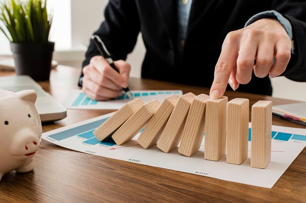 A man working on the challenges in a risk management process 