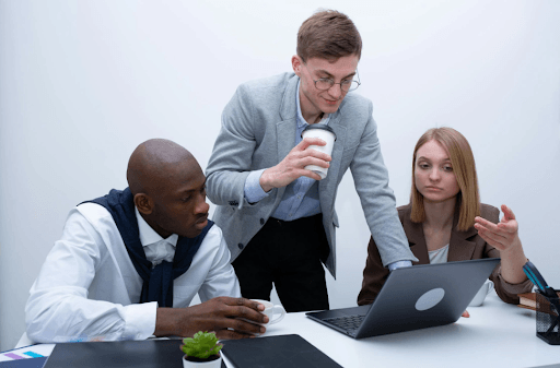 Professionals discussing KPIs and KRIs in a business setting