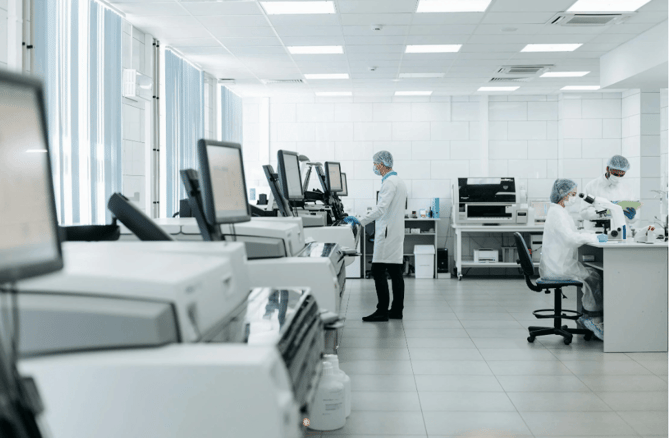 Medical practitioners in a laboratory adhering to regulatory compliance in the healthcare industry